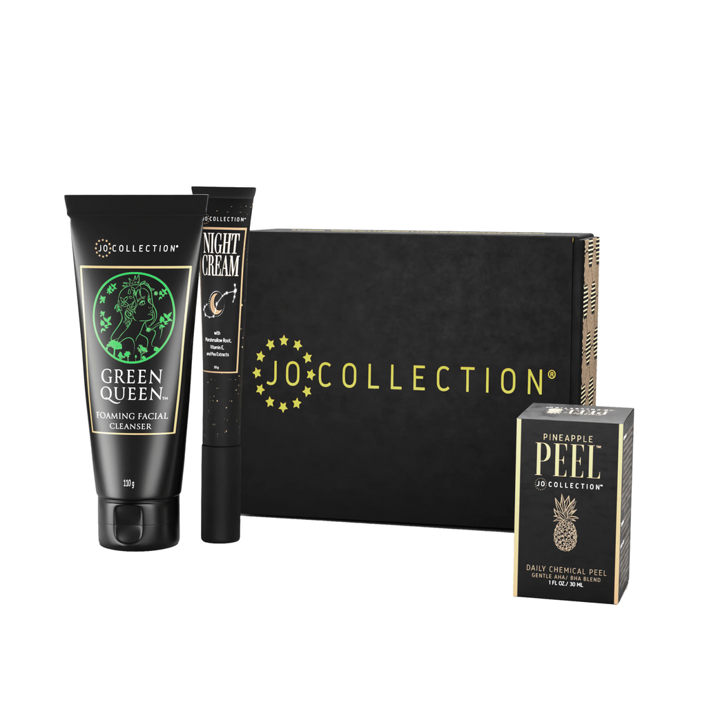 A collection of skincare products from Jo Collection, including a facial cleanser, night cream, and pineapple peel product, packaged in a black box.